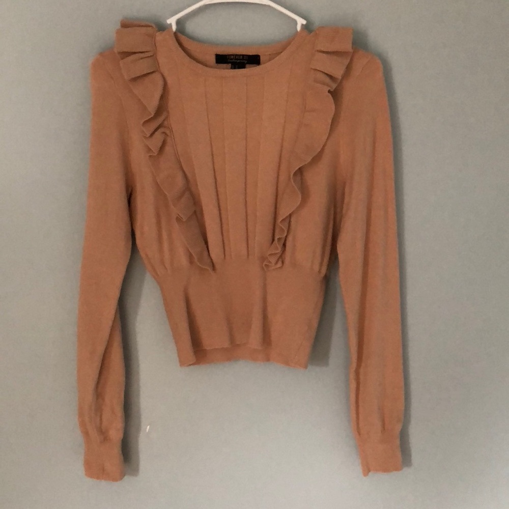 Soft pink sweater with shoulder ruffles